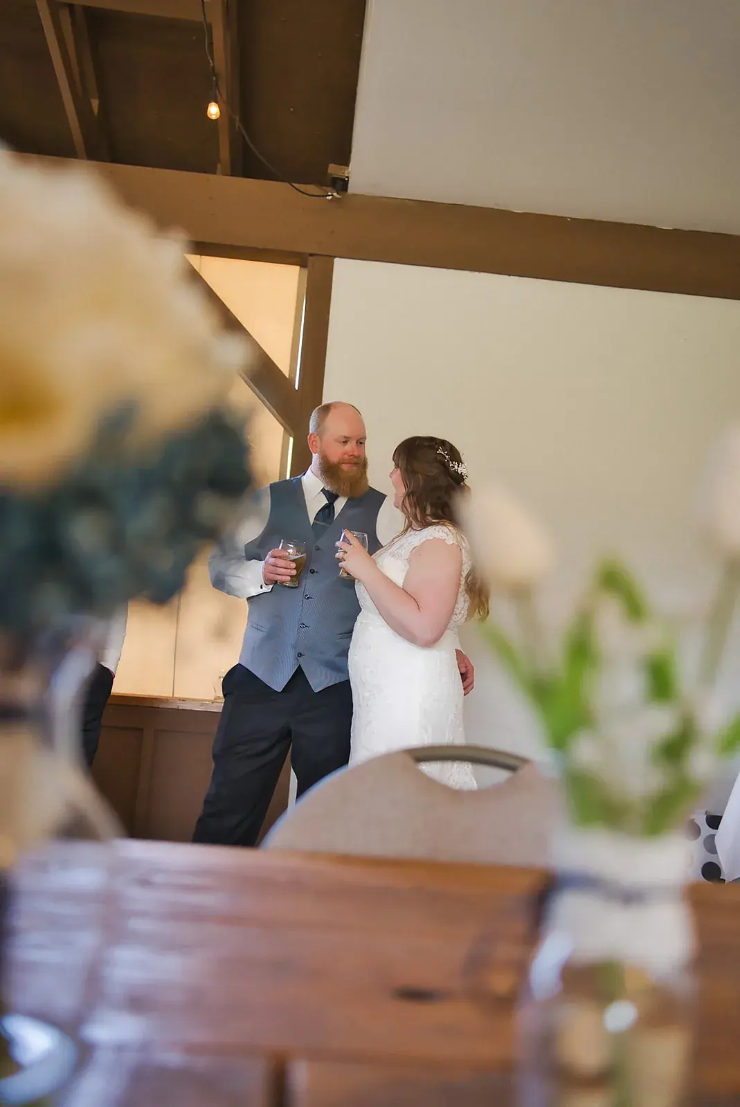 Reception candid celebration — Kayla & Robert's wedding at Mackinaw Trail Winery, Petoskey