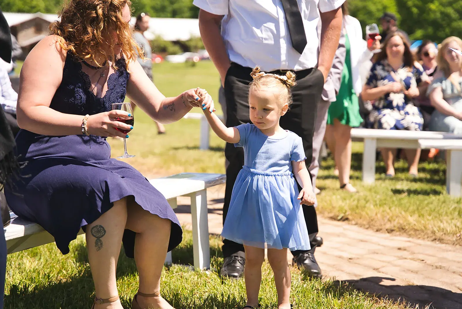 Reception guests candid — Kayla & Robert's wedding at Mackinaw Trail Winery, Petoskey