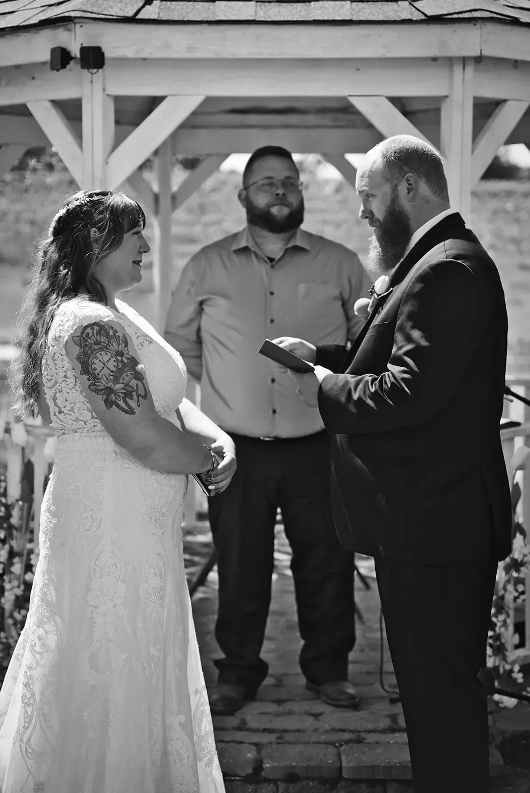 Ring exchange gazebo in black and white — Kayla & Robert's wedding at Mackinaw Trail Winery, Petoskey