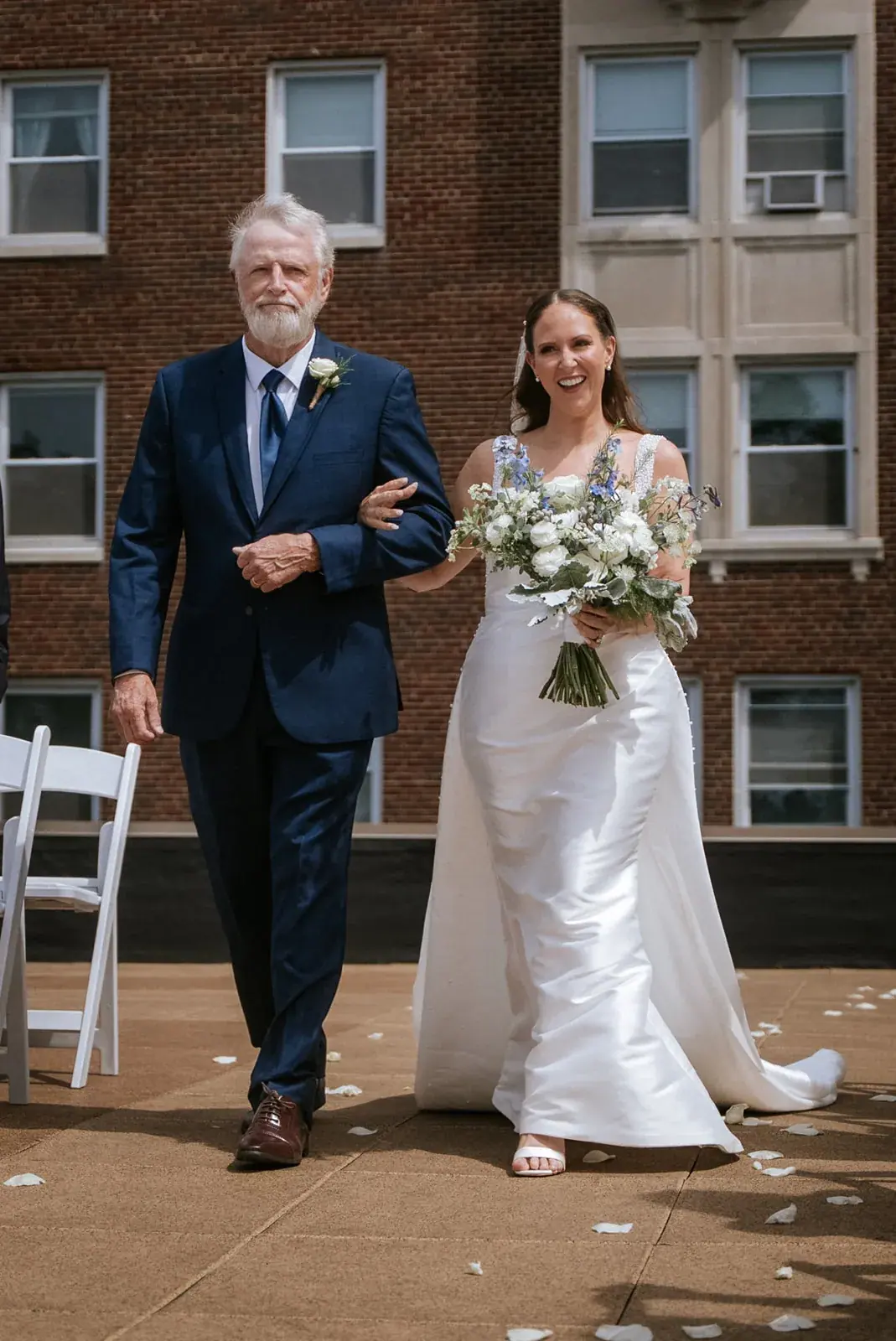 Father escorting bride whitcomb — Kelly & Ezra's wedding at Aria at The Whitcomb, St. Joseph