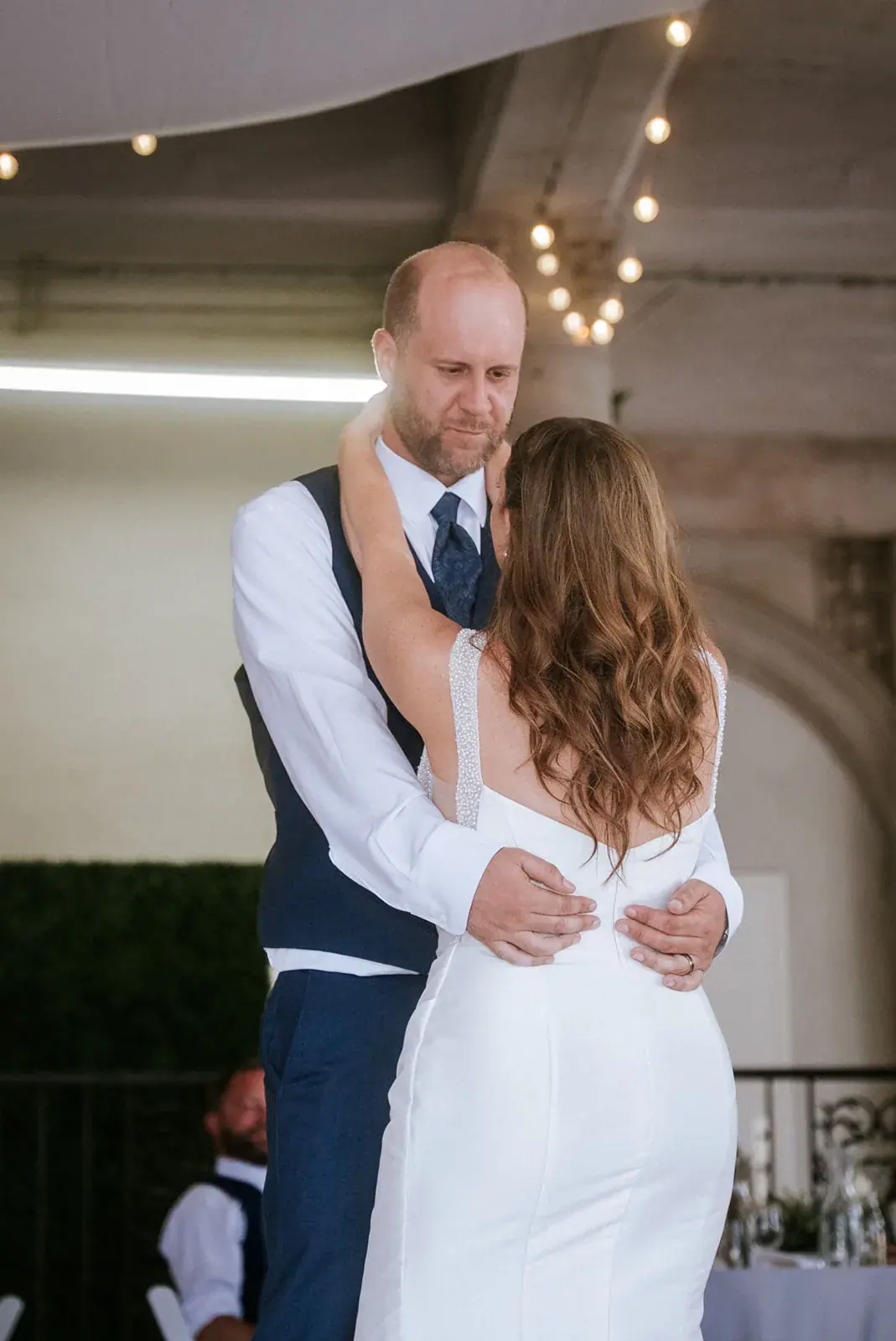 First dance embrace — Kelly & Ezra's wedding at Aria at The Whitcomb, St. Joseph