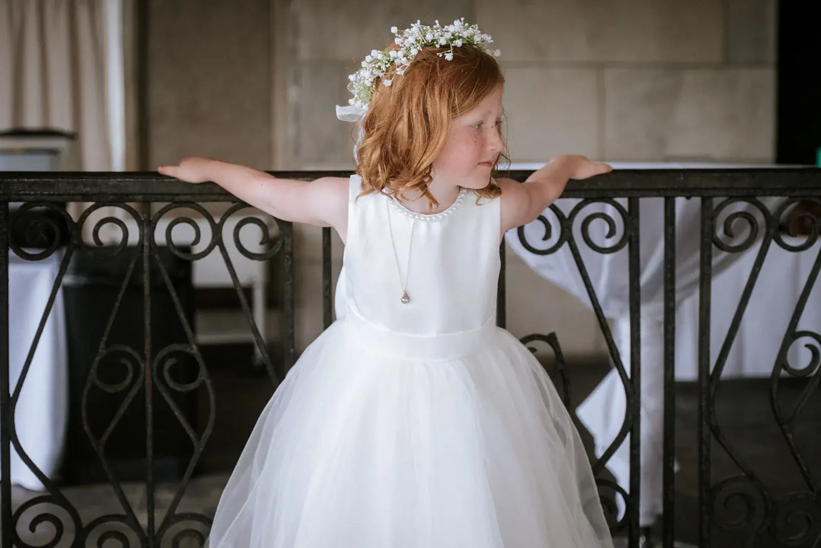 Flower girl balcony — Kelly & Ezra's wedding at Aria at The Whitcomb, St. Joseph