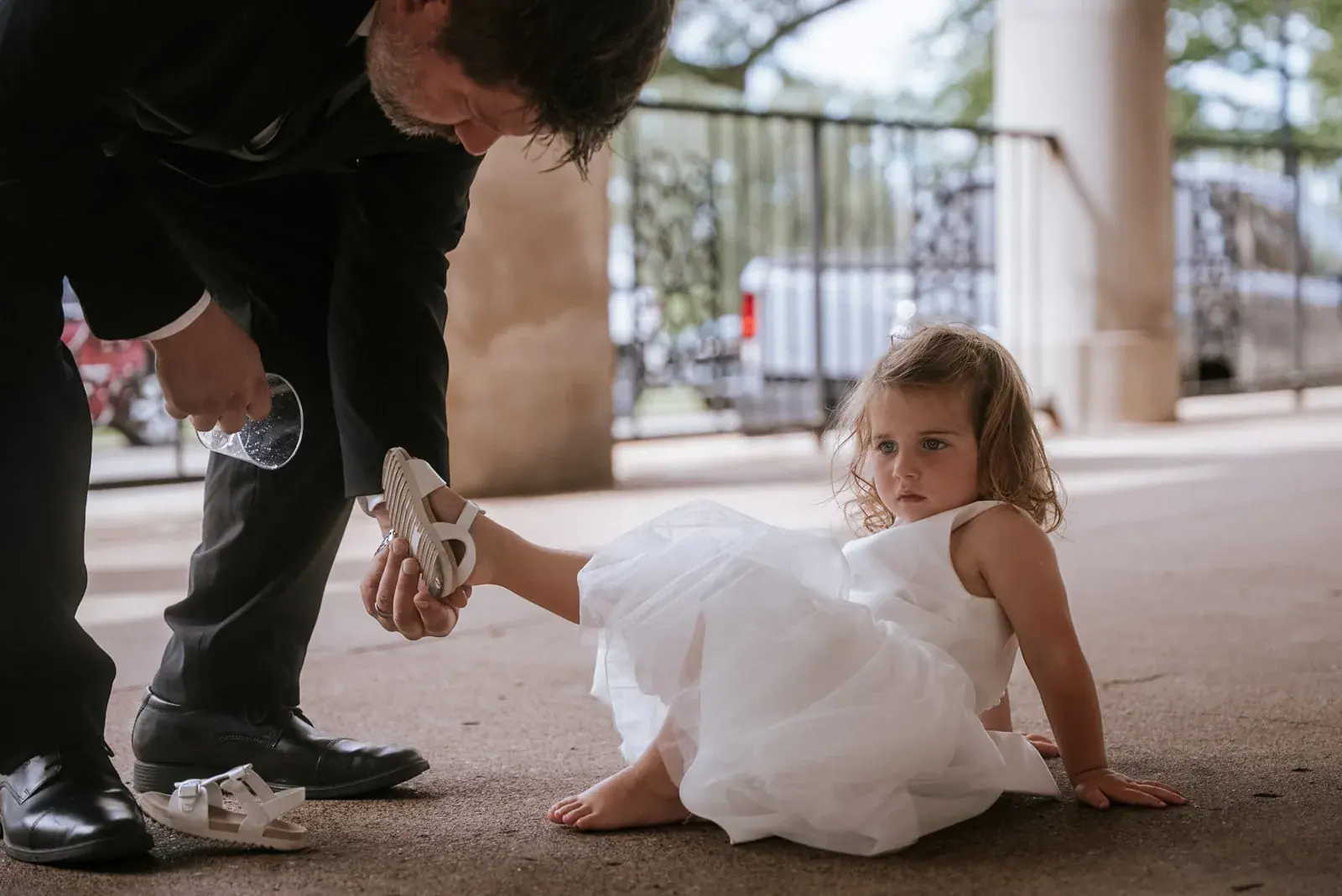 Flower girl candid — Kelly & Ezra's wedding at Aria at The Whitcomb, St. Joseph