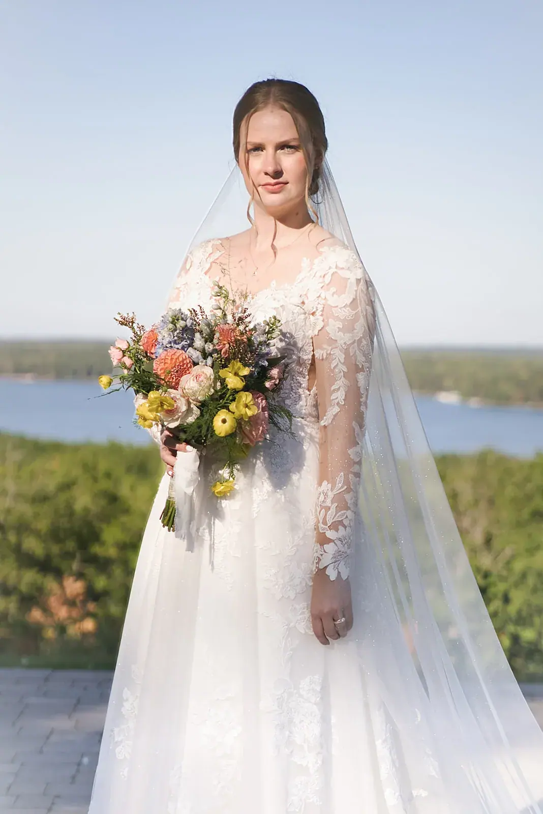 Bride bouquet lake view — Megan & AJ's wedding at The Manor at Fire Tower Hill, Lewiston
