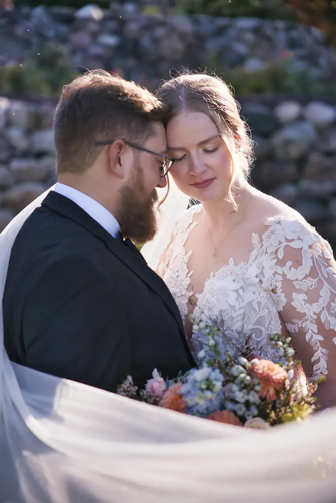 Bride and groom foreheads veil — Megan & AJ's wedding at The Manor at Fire Tower Hill, Lewiston