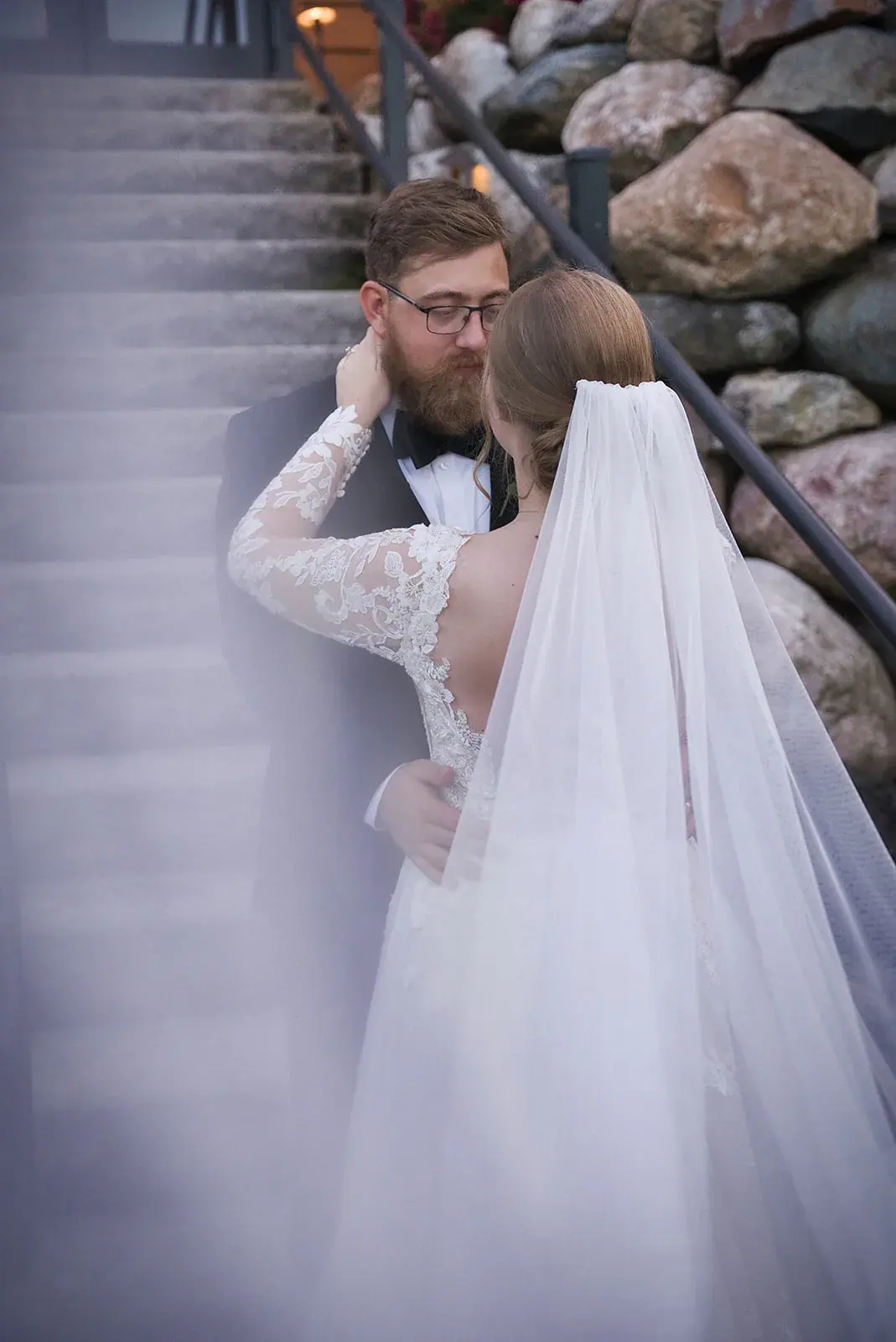 Bride and groom veil stone steps — Megan & AJ's wedding at The Manor at Fire Tower Hill, Lewiston