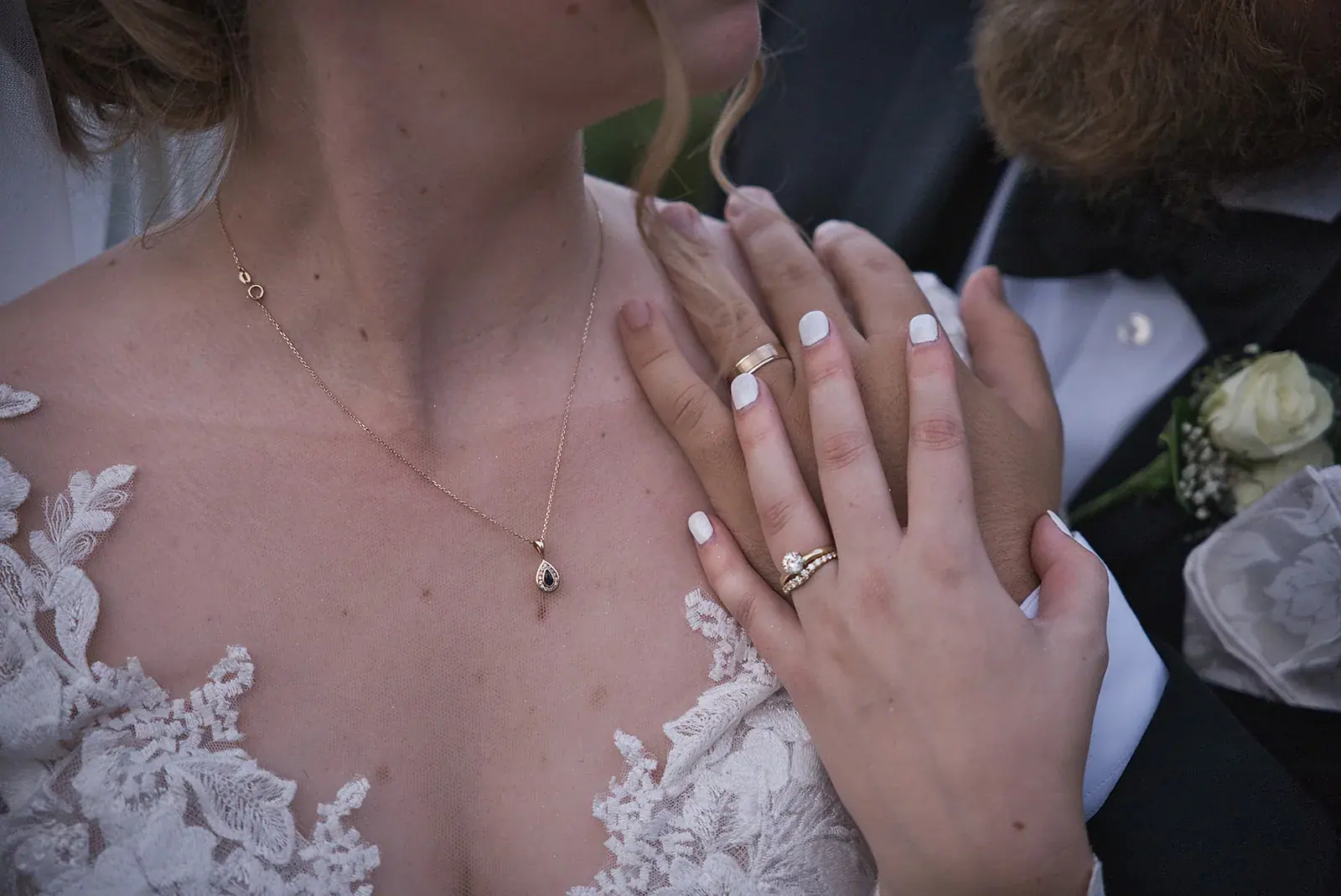 Bride necklace hand detail — Megan & AJ's wedding at The Manor at Fire Tower Hill, Lewiston