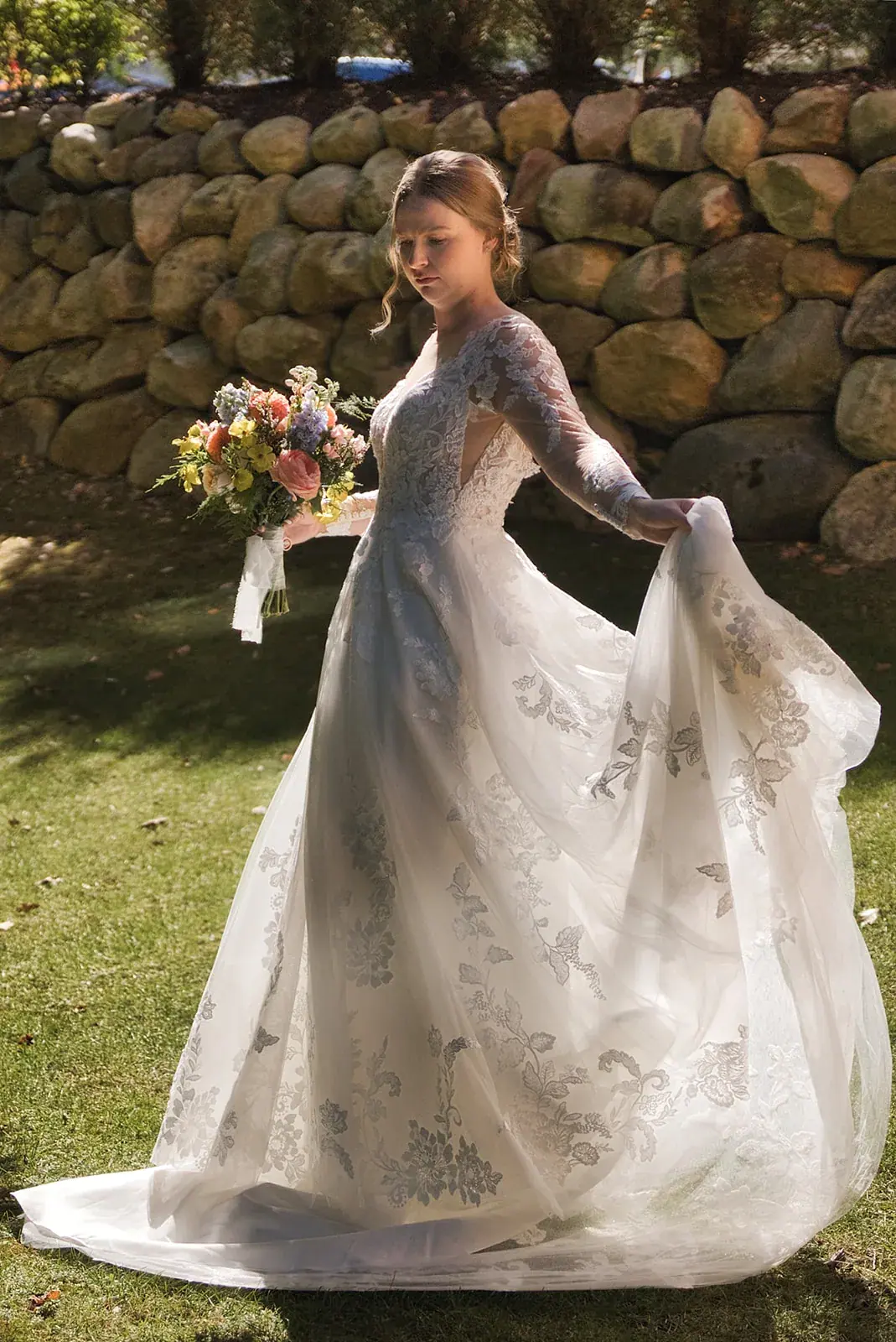 Bride twirling dress sunlight — Megan & AJ's wedding at The Manor at Fire Tower Hill, Lewiston