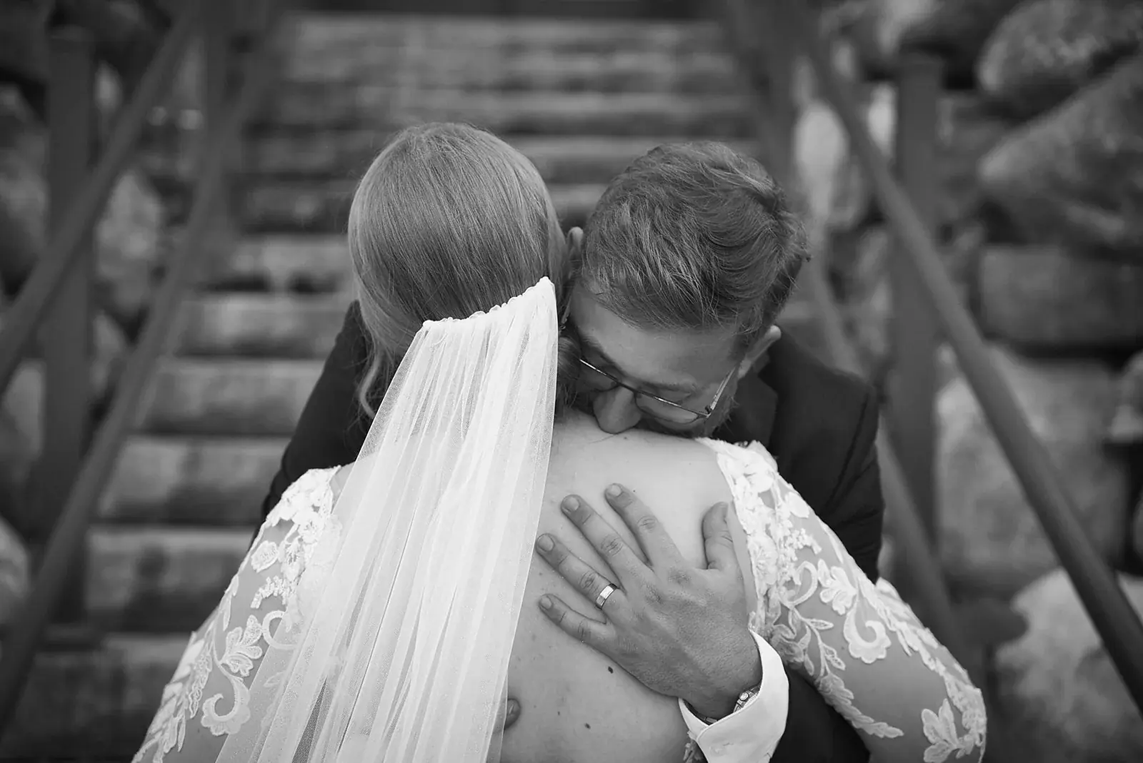 First look hug in black and white — Megan & AJ's wedding at The Manor at Fire Tower Hill, Lewiston