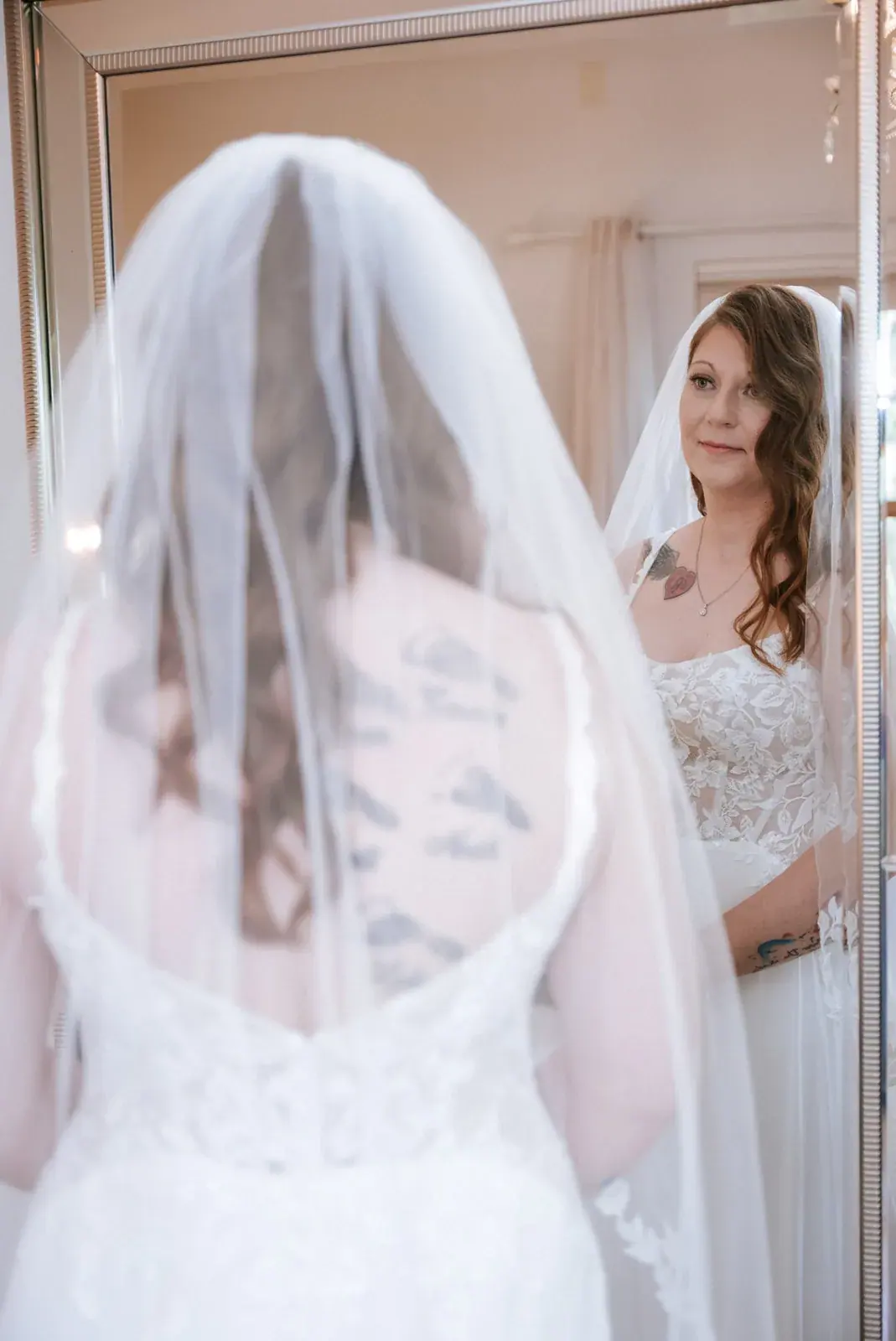 Bride veil first look — Patty & Nick's wedding at The Manor at Fire Tower Hill, Lewiston