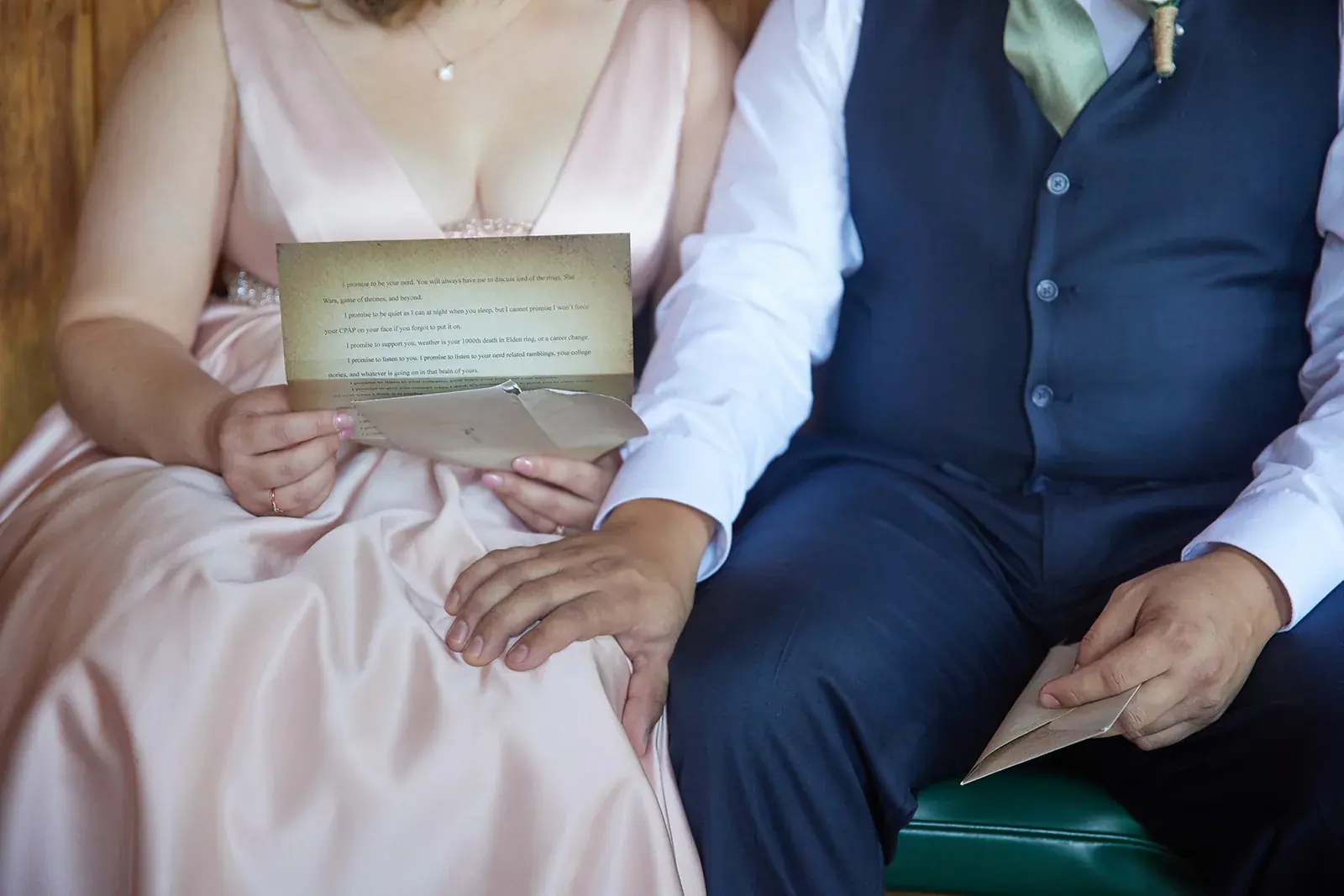 Bride and groom letters hands — Rachel & Alberto's wedding at Higher Ground at Lake Louise, Boyne Falls