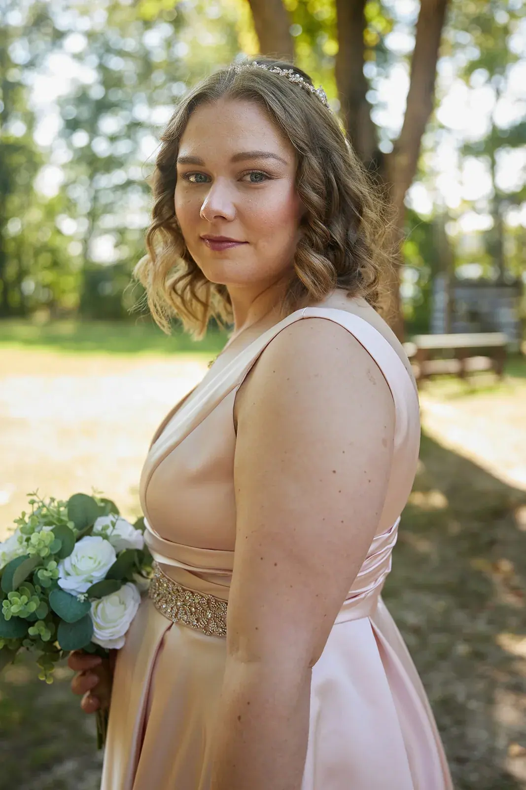 Bride over shoulder portrait — Rachel & Alberto's wedding at Higher Ground at Lake Louise, Boyne Falls