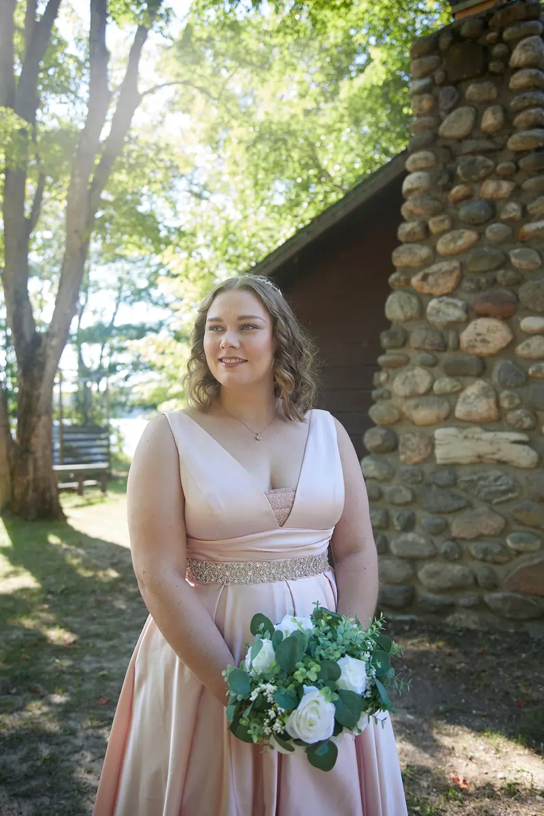 Bride portrait stone cabin — Rachel & Alberto's wedding at Higher Ground at Lake Louise, Boyne Falls