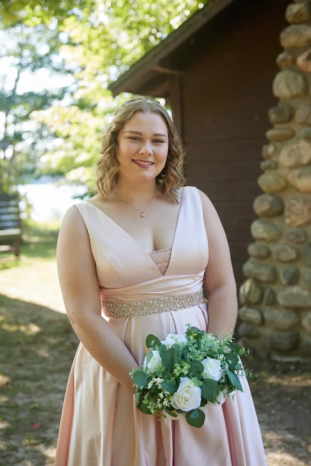 Bride portrait stone chimney — Rachel & Alberto's wedding at Higher Ground at Lake Louise, Boyne Falls