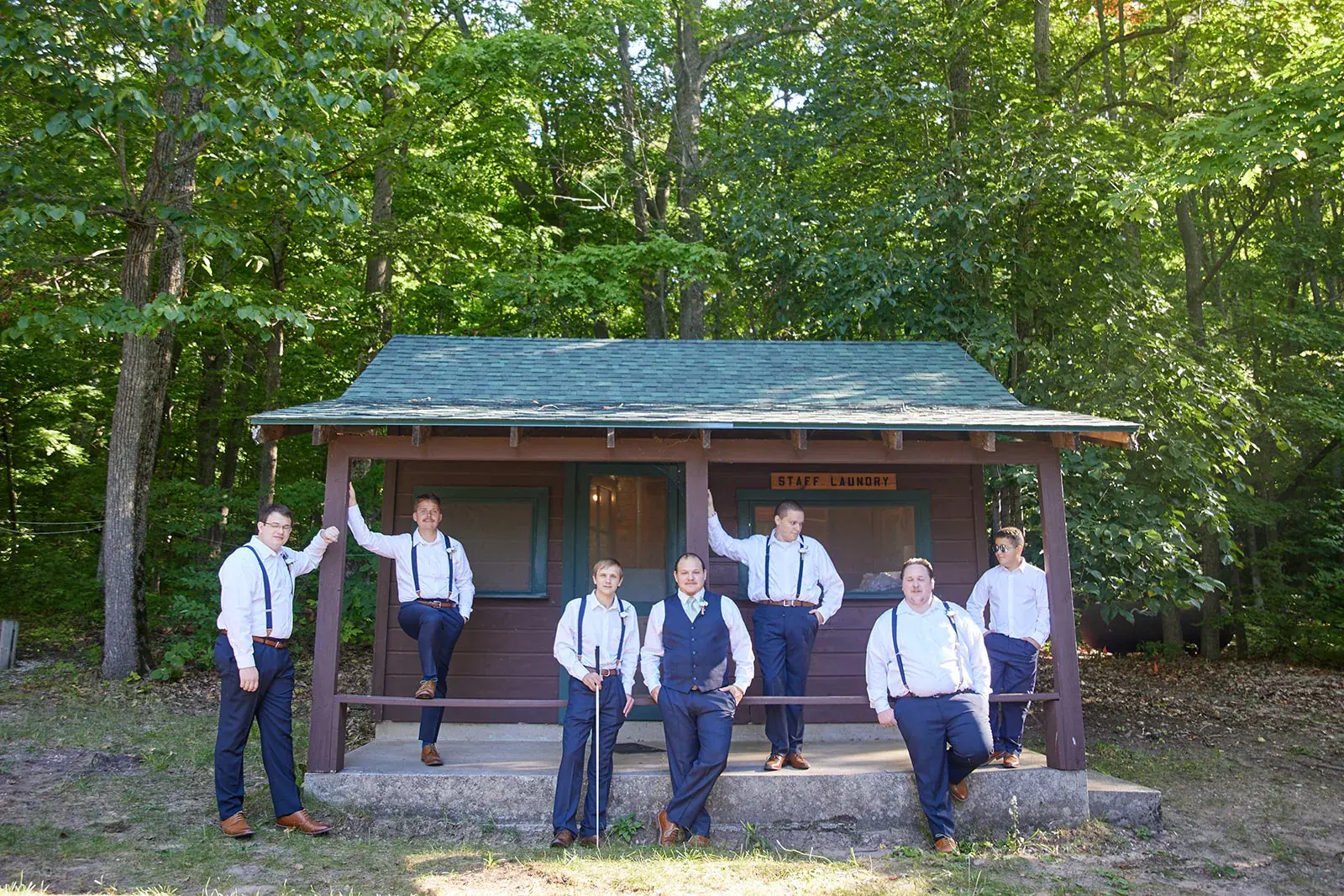 Groomsmen cabin porch — Rachel & Alberto's wedding at Higher Ground at Lake Louise, Boyne Falls