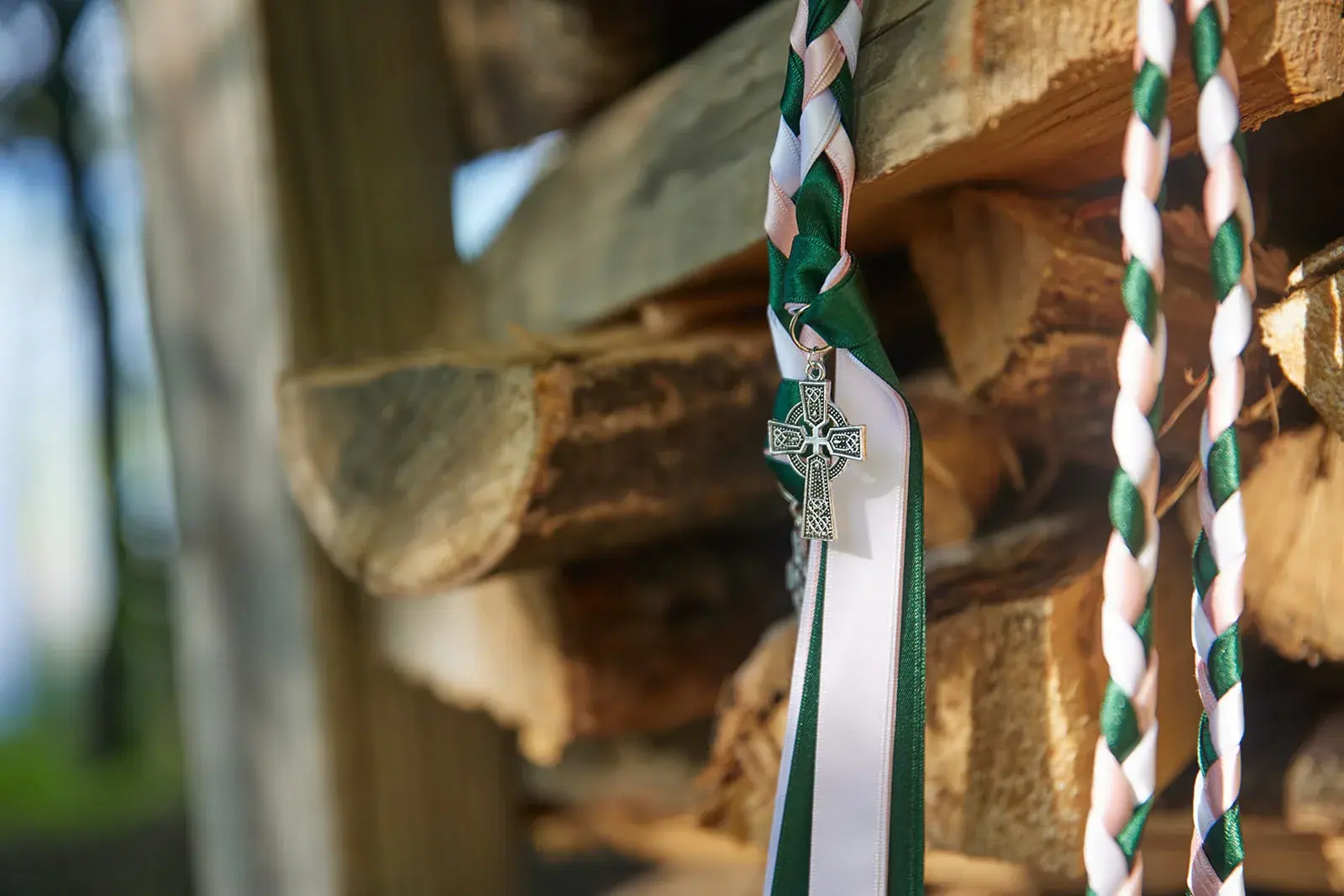 Handfasting cord hanging — Rachel & Alberto's wedding at Higher Ground at Lake Louise, Boyne Falls